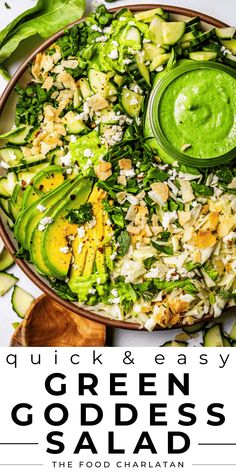 green goddess salad with avocado and feta cheese in a wooden bowl on a white background