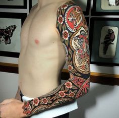 a man with a tattoo on his arm