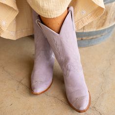 The KARIMA cowgirl boot for women is a gorgeous addition to any ensemble. Made of soft, luxurious suede in a beautiful lilac color, these boots will make a statement wherever you go. Perfect for any occasion, they'll make you feel pretty and confident every time you slip them on. Height: 13" Purple Ankle Boots For Spring, Purple Leather Spring Boots, Spring Purple Leather Boots, Purple Pointed Toe Winter Boots, Purple Heeled Boots For Winter, Fitted Purple Ankle Boots, Purple Snip Toe Boots For Fall, Purple Ankle Heeled Boots For Fall, Chic Purple Pointed Toe Boots