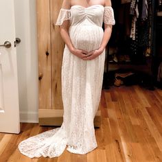 White Lace Off The Shoulder Maternity Gown 65% Cotton, 35% Polyester Pit To Pit: 11.5” Under Bust (Empire Waist): 12.5” Apx Hip Width: 25” Apx Length: 54” Stunning Dress, New With Original Packaging (It Came In A Bag From Amazon Without Hang Tags) - I Bought It As An Option For Our Maternity Photos And Forgot To Return It In Time! White Lace Maternity Maxi Dress, White Lace Maternity Gown, White Lace Full Length Dress, White Full-length Lace Dress, White Full Length Lace Dress, Spring Bridal Shower Fitted Maxi Dress, White Fitted Maxi Dress For Bridal Shower, Fitted White Gown For Bridal Shower, White Fitted Gown For Bridal Shower