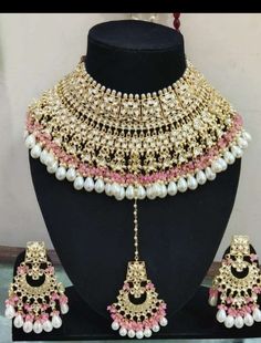 Handmade item Dispatches from a small business in India Materials: Copper Jewellery type: Earrings, Necklace Description High Quality Bridal Gold Plated Pearl Polki Kundan Necklace Set With Chandbalis/Sabyasachi Inspired Wedding jewelry set/Pakistani Punjabi This gorgeous kundan bridal set is made keeping in mind the Elegance of an Indian bride. Keeping the look heavy but with simple earrings & matching mathapatti and A Nath . The Sabyasachi Inspired Bridal Set is Sure to Make you Big Day . Details : Made of premium quality Polki kundan on all pieces. Green/White/Maroon beads and Pearls motis. Customized orders takes 3 to 4 weeks, depending on piece requirements. Ayesha Creation Jewelry pieces can be customized in accordance with your requirement. Ceremonial Pink Kundan Jewelry, Pink Kundan Necklace For Ceremonial Occasions, Traditional Jewelry With Mirror Work For Reception, Pink Bollywood Kundan Necklace For Ceremonial Occasions, Traditional Mirror Work Jewelry For Reception, Pink Bollywood Jewelry For Ceremonial Occasions, Mirror Work Jewelry For Reception At Diwali, Traditional Chandbalis With Mirror Work For Reception, Pink Bollywood Ceremonial Jewelry