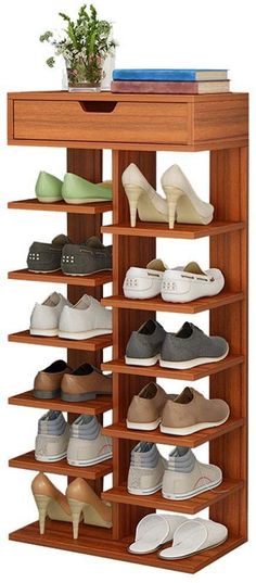 a wooden shoe rack with several pairs of shoes