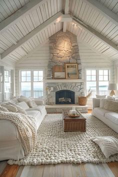 a living room filled with furniture and a fire place in the middle of a room