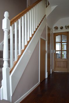 the stairs in this house are painted white