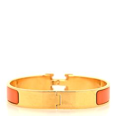 This is an authentic HERMES Enamel Narrow Clic Clac H Bracelet GM in Orange. This chic bracelet is made of gold-plated hardware with a swivel H and features an orange enamel inlay. H Bracelet, Chic Bracelet, Plating, Bracelet, Orange, Gold