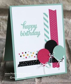 a happy birthday card with balloons and confetti on the edge, in front of a brick wall