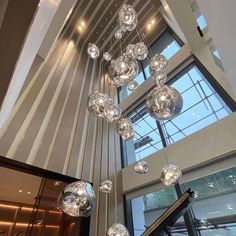 a chandelier hanging from the ceiling in a building