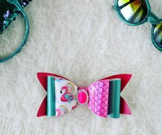 These accessories are just adorable! It's a perfect mermaid combo! 👌💫 #mermaid #accessorize #hairbows Mermaid Faux Leather Earrings, Mermaid Tail Faux Leather Earrings, Disney Cheer Bows, Mermaid Faux Leather Bow, Pink Glitter Hair Bow, Mermaid