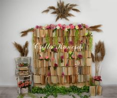 a display made out of books and flowers