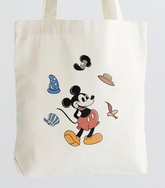 It all started with a mouse! Our version of the main mouse himself! Tote bag available for everyday use and park visits! White Mickey Mouse Bags For Daily Use, White Mickey Mouse Bag For Daily Use, Cute Mickey Mouse Bag For Daily Use, Cute Mickey Mouse Bags For Everyday Use, Cute Mickey Mouse Bags For Daily Use, Playful Mickey Mouse Bags For Disney Trips, Playful Mickey Mouse School Bags, Disney Handbags Totes, Cute Mickey Mouse Bags For Travel