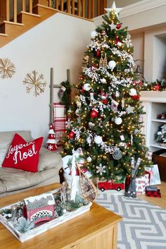 a decorated christmas tree in a living room