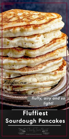 a stack of pancakes on top of a pancake covered in fluffy, lightly fried flour