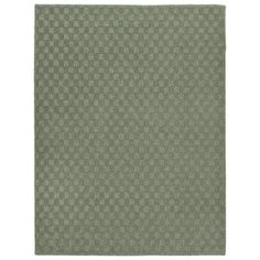 a green rug with small squares on the bottom and one square in the middle, against a white background