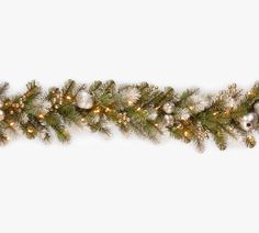 a christmas garland with silver and gold ornaments on it's side, against a white background