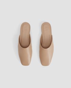 The Leather Day Mule Blush Tan – Everlane Classic Closed Toe Mules For Everyday, Leather Slip-on Mules With Sculpted Heel, Modern Everyday Mules With Leather Sole, Leather Footbed Slip-on Mules For Everyday, Everyday Slip-on Flat Heel Mules, Everyday Slip-on Mules With Flat Heel, Everyday Flat Heel Slip-on Mules, Classic Square Toe Mules For Office, Classic Mules With Sculpted Heel For Business