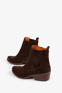 The Rove Boots by Penelope Chilvers feature a soft suede upper and are cropped to the ankle with a low Cuban heel, side zip, and tonal satin metallic elastic. | Rove Suede Boots by Penelope Chilvers in Brown, Women's, Size: 37, Polyurethane/Suede at Anthropologie Penelope Chilvers, Brown Suede Ankle Boots, Cuban Heels, Black Suede Boots, Suede Ankle Boots, Womens Boots Ankle, Tall Boots, Soft Suede, Suede Boots