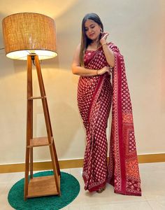 Type : Saree Saree Color : Maroon  Blouse Color : Maroon   Saree Length : 5.5 Mtrs (With Blouse) Blouse Length : 0.80 Mtr Fabric : Cotton  Work : Printed Care Instruction : Hand Wash Product Code : 50009