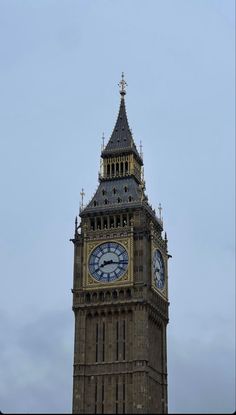 the big ben clock tower towering over the city of london