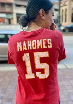 Patrick Mahomes Kansas City Chiefs Red Name And Number Short Sleeve Fashion Player T Shirt - 18240854 Collegiate Tops For Fan Events With Team Name, Team-colored Tops For Sports Season Fan Events, Team-colored Tops With Team Name For Fan Events, Fan Event Tops With Team Name, Football Season Fan Apparel Tops, Team Spirit Tops For Sports Season Fan Events, Sports Fan Tops With Letter Print For Fan Events, Collegiate Red Sublimation T-shirt With Letter Print, Football Season Fan Merchandise Tops