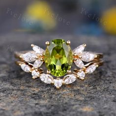 Moissanite ring,peridot ring,engagement ring,promise ring,bridal ring,stacking ring set,oval peridot ITEM SPECIFICATIONS: Material:Solid gold (10k 14k 18k rose gold,yellow gold,white gold Platinum available) Peridot engagement ring: Main stone: 6x8mm oval cut natural peridot Accent stone:with marquise cut moissanite (diamond is available,please contact us if you need) Band width:approx 1.5mm Setting:prongs and pave set Matching band: Stone:with marquise cut moissanite (diamond is available,pleas Peridot Wedding Ring Set, Peridot Stone Ring, Diamond And Peridot Ring, Peridot Diamond Ring, Opal And Peridot Ring, Diamond And Peridot Engagement Rings, Peridot And Emerald Ring, Engagement Ring Peridot, Peridot Engagement Rings Gold