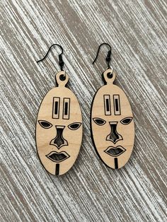 African art, represented through these traditional earrings, is perfect for all occasions and is handmade with maple and basswood material. Elegant and Eco-friendly. Traditional Handmade Natural Wood Jewelry, Natural Color Earrings For Gift, Unique Brown Plug Earrings As Gift, Handmade Artistic Brown Earrings, Artistic Handmade Brown Earrings, Wooden Earrings For Gift, Unique Handmade Natural Wood Jewelry, Natural Wood Drop Earrings, Unique Brown Wooden Beads Earrings