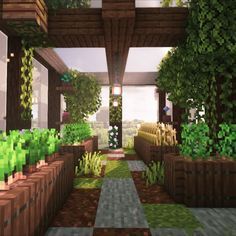 the inside of a building with lots of plants and trees on it's sides