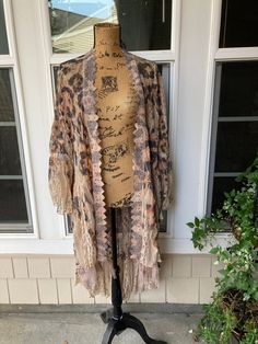 Stevie Nicks Duster, Boho chic leopard and lace kimono, Festival style One size fits allTruly flexible, flattering and forgiving! Fits small to 3x. You will love all the ways you can wear this. This style is a fun, easy fit to wear over shorts and bathing suits in the summer or layer over a long sleeve in the cooler seasons. An essential, year round style! I travel to art shows throughout the year Runway 45 specializes in flexible fit styles Follow me on Tic Toc & Instagram for examples of style Stevie Nicks Style Outfits, Stevie Nicks Songs, Unique Cardigan, Textured Fabrics, Stevie Nicks Style, Antique Tiffany, Chic Cardigan, Tic Toc, Lace Kimono