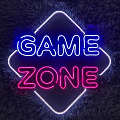 a neon sign that says game zone on it