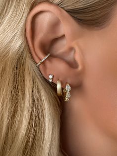 Add a beautiful and eye-catching touch to any outfit with these Mini Tear Drop Stud Earrings. Crafted with two cubic zirconias in the shape of a tear drop, this earring set adds a unique twist to a classic stud design. Perfect for any occasion. Stone: Cubic Zirconia 3mm & 2mm Stone: Cubic ZirconiaMaterials: Sterling Silver & 14K Gold Vermeil Stud Design, Huggie Earring, Gold Bond, Vermeil Jewelry, Demi Fine Jewelry, Diamond Drops, Huggie Earrings, Opal Stone, Fabulous Jewelry