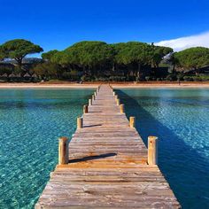 a long wooden dock extending into the water