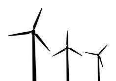 three wind turbines are shown in black and white