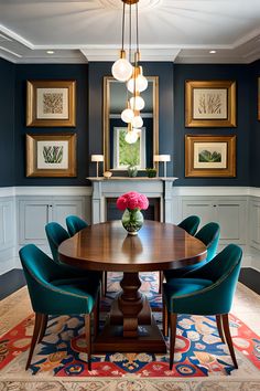 a dining room table surrounded by blue chairs