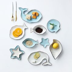 a table topped with plates and bowls filled with food