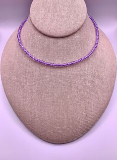 Purple Seed Bead Necklace ~ Approximately 14 inches ~ see note Tiny beaded necklaces are perfect summer accessories and great for layering! Details: * 3-4mm (approx.) Seed Beads * 2.5 inches (approx.) Stainless Steel Extender Chain * Silver Tone Lobster Clasp **PLEASE NOTE ** ~ Seed Beads are uniquely different shapes. The seed beads are approximately 3-4mm. ~ Beaded portion is approx. 14 inches. ~ Extender is approx. 2.5 inches. Get 5% OFF all orders $45 and up! Use code 5offULLA at checkout! Purple Minimalist, Seed Bead Choker, Beach Necklace, Bead Choker, Beach Necklaces, Necklace Purple, Purple Necklace, Chain Silver, Seed Bead Necklace