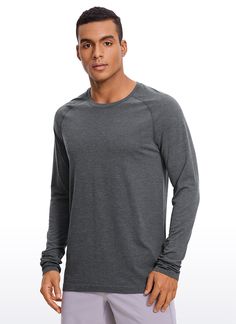 This workout long sleeve is breathable and wicking sweat fast, featuring thumb holes and form-fitting. Feature & Fitting: 
 Seamless collection 
 Design for workout or training 
 Round neck and raglan sleeves 
 Slim fit, show your muscle curve 
 Fabric: 
 Fast sweat-wicking keep you dry 
 Minimal seams to reduce chafe 
 Stretch, good elasticity, no sense of restraint 
 1)51%Polyamide,44% Polyester,5% Spandex 
 SKU : NZ09 .Easy reach by searching the SKU Sports Activewear With Thumbholes And Crew Neck, Crew Neck Activewear With Thumbholes For Gym, Long Sleeve Tops For Light Sports, Crew Neck Activewear With Thumbholes For Running, Sporty Crew Neck Long Sleeve Workout Top, Solid Activewear With Thumbholes, Crew Neck, Long Sleeve Activewear With Thumbholes For Workout, Long Sleeve Activewear For Training, Grey Long Sleeve Athleisure Top