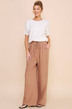 Get ready to relax in style with the Allie Linen Pants. These pants are not only comfy and practical, but also the perfect choice for a chic and versatile outfit. With a simple white top, you can create a cozy and stylish look effortlessly. Don't miss out on the easiest, comfiest, and most stylish pants you'll ever own! Midsize Linen Pants Outfit, Beige Linen Pants Outfit, Beige Linen Pants, Linen Outfit, Linen Pants Outfit, Linen Pant, Stylish Pants, Midi Cocktail Dress, Versatile Outfits