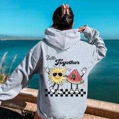 Retro Sunshine and Watermelon Guys Aesthetic Unisex Hoodie. Better Together Motivational Positive Sayings Sweatshirt. This vintage aesthetic hoodie is super soft and cozy and would be perfect gift for a friend or for a mom for mothers day.  Please size up 1 to 3 sizes for an oversized look! This unisex heavy blend hooded sweatshirt is relaxation itself. Made with a thick blend of cotton and polyester, it feels plush, soft  and warm, a perfect choice for any cold day. In the front, the spacious kangaroo pocket adds daily practicality while the hood's drawstring is the same color as the base sweater for extra style points. .: 50% cotton, 50% polyester (fiber content may vary for different colors) .: Medium-heavy fabric (8.0 oz/yd² (271 g/m .: Classic fit .: Tear-away label .: Runs true to si Cute Relaxed Fit Hoodie For Winter, Cute Hoodie Sweatshirt With Letter Print, Oversized Cute Hooded Sweatshirt, Cute Oversized Hooded Sweatshirt, Cute Oversized Cotton Hoodie, Oversized Cute Cotton Hoodie, Cute Oversized Hoodie With Letter Print, Cute Hoodie Sweatshirt For Streetwear, Cute Crew Neck Hoodie For Streetwear