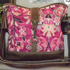 For All The Pinky Dinky Dollies Out There, Showcase Your Exuberance With The Blossomy Charm Of The Exuberance Shoulder Bag From Myra Bags. Super Spacy, Adjustable Straps To Suit Your Height And An Upcycled Rear Side. Upcycled Canvas, And Leather - 14"W X 4.5"D X 11.5"H - Shoulder Strap 23" - Top Zipper Enclosure - Front Clasp Closure - Exterior Zip Pocket On Back - 2 Small Slip Pockets On Front Interior - 1 Small Slip Pocket Back Interior - Lined Interior - Adjustable Shoulder Strap Bohemian Pink Crossbody Shoulder Bag, Pink Bohemian Crossbody Shoulder Bag, Pink Bohemian Hobo Bag With Adjustable Strap, Bohemian Pink Satchel Bag, Pink Bohemian Shoulder Bag With Leather Handles, Bohemian Pink Bag With Removable Pouch, Bohemian Pink Shoulder Bag With Leather Handles, Bohemian Shoulder Bag For Errands, Everyday Bohemian Pink Bag