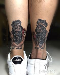 two people with matching tattoos on their legs