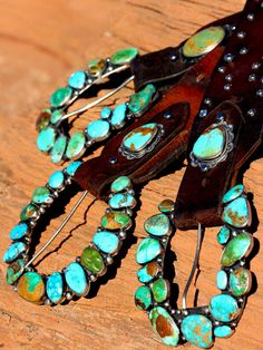 "On the Range" turquoise ranger buckles, what a statement! These buckle are inspired, artful creations and look amazing with any belt combination, especially the "Wild West" turquoise conchos. They are a fine combination of several American mines, including Royston, Piolet, Kingman and Sonoran gold. "On the Range" our horseshoe ranger shape is about 4 by 4 inches of the best turquoise money can buy.. Size and quality of stones can vary so pricing these is very challenging, so please contact us f Southwestern Turquoise Concho Belt Buckles, Turquoise Western Belt With Concho, Western Turquoise Belt With Concho, Adjustable Turquoise Western Belt Buckles, Turquoise Bohemian Belt With Concho, Turquoise Bohemian Belt Buckle With Antique Detail, Cowboys Hats, Turquoise Belt, Hats Summer