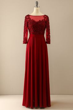 a red evening gown on a mannequin