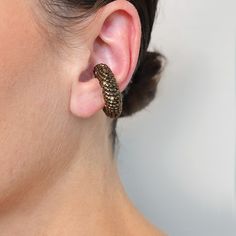 This Earcuff is sold as a single unit piece for use on one ear. Non-adjustable design COLOR: BROWNHEIGHT: 3 cm / 1.2 in WIDHT: 1.1 cm / 0.4 in WEIGHT: 6 gr / 0.2 oz UNITMATERIALS: Glass Beads, resin. Our jewelry is hand-creafted with the utmost care and a slight variation may exist between pieces. Our metallic parts are composed of 24kt gold plated bronze or Rhodium plated silver 925. Adjustable Brass Single Ear Cuff, 24kt Gold, Ear Cuffs, Small Detail, Ring Collections, Design Color, Earring Necklace, Ring Necklace, Have Fun