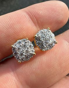 "Super Iced Out mens or womens round cluster earrings 1.2ct VS D color excellent cut moissanite stones PASSES DIAMOND TESTER ANY PEN OR LIGHT TRANSMISSION DIAMOND TESTER (Will show up as moissanite and not diamond on lab assays however) Comes with GRA certificate Nice micropave setting 14k gold vermeil over Solid 925 sterling silver! Wont turn your ears green, contains no nickel or brass! Nice round stones! About 1/3\" (8mm) wide perfect medium size! Pair weighs around 3 grams Screw backs for a Fine Jewelry Brilliant Cut Round Cluster Earrings, Fine Jewelry Round Brilliant Cut Cluster Earrings, Fine Jewelry Round Cluster Earrings With Vvs Clarity, Fine Jewelry Round Cluster Earrings With Brilliant Cut, Diamond White Round Cluster Earrings, Yellow Gold Cluster Earrings With Brilliant Cut, Brilliant Cut Cluster Earrings In Yellow Gold, Anniversary Brilliant Cut Cluster Earrings, Vvs Clarity Round Cluster Earrings Fine Jewelry