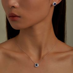 Timeless elegance for everyday wear. This adjustable halo necklace features a princess-cut blue lab-grown sapphire surrounded by Lafonn's signature Lassaire oval and baguette simulated diamonds. The necklace is set in sterling silver bonded with platinum. 20" adjustable chain Includes necklace box Ships fully insured to point of delivery