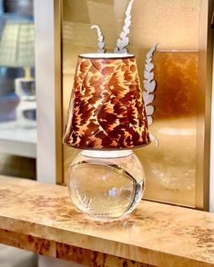 Tortoise wallpaper lampshade on a crystal lamp Wallpaper Lampshade, Tortoise Wallpaper, Light Inspiration, Celerie Kemble, Iconic Wallpaper, Paper Lampshade, Charlottesville Virginia, Cordless Lamps, Table Scape