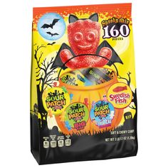 a bag of gummy halloween treats with bats and pumpkins on the front,