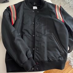 Black Burberry Jacket Size Medium Brand New Luxury Black Varsity Jacket For Fall, Luxury Black Varsity Jacket For Winter, Black Varsity Jacket With Pockets For Work, Luxury Black Varsity Jacket With Padded Collar, Designer Black Varsity Jacket For Streetwear, Luxury Black Outerwear With Pockets, Modern Black Outerwear With Padded Collar, Black Luxury Outerwear, Classic Black Varsity Jacket With Pockets