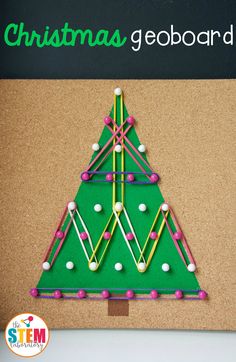 a christmas tree made out of pops sticks on a bulletin board with the words christmas geoboard written above it