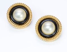 Chanel Enamel Pearl Earrings Vintage 1960’s CHANEL gold tone black enamel and pearl earrings in very good condition, with one slight dent on the back...Nothing Major! Collectors item!Approximate Measurements: Diameter 1.3”Made in France Formal Enamel Clip-on Earrings, Classic Enamel Earrings For Formal Occasions, Classic Formal Enamel Earrings, Elegant Enamel Clip-on Earrings For Evening, Vintage Chanel Jewelry, Chanel Jewelry, Earrings Vintage, Vintage Chanel, Round Earrings