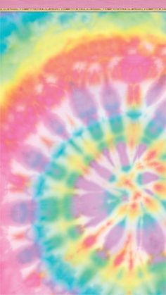 a multicolored tie - dye pattern is seen in this image